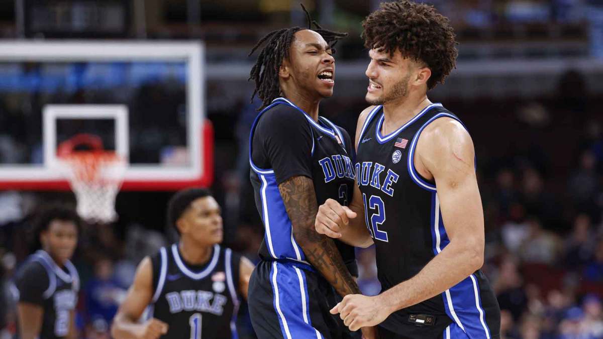Duke Blue Devils forward Cameron Boozer (12) celebrates with guard Isaiah Evans (3) during the second half at United Center.