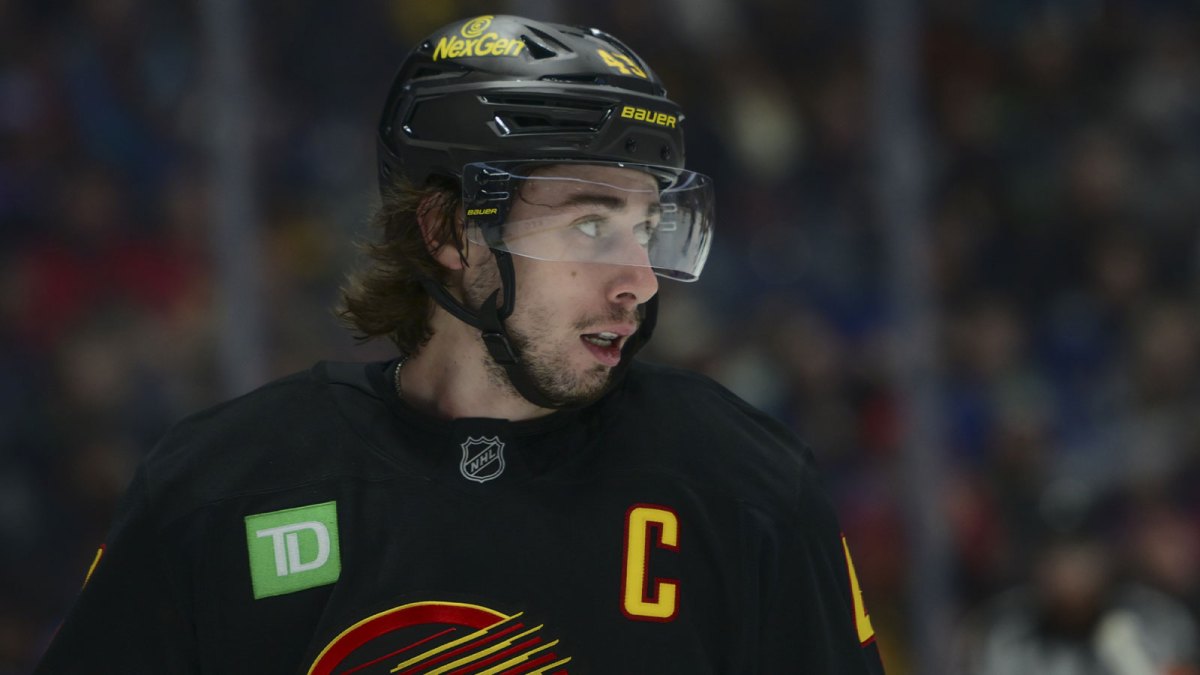 Vancouver Canucks defenseman Quinn Hughes (43) looks on during the second period against the Calgary Flames at Rogers Arena.