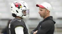 Arizona Cardinals quarterback Kyler Murray (1) talks with head coach Jonathan Gannon during training camp at State Farm Stadium in Glendale on Aug. 6, 2025.