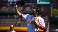 St. Louis Cardinals third baseman Nolan Arenado (28) salutes the fans after he was ceremonially removed before the start of the first inning against the Milwaukee Brewers at Busch Stadium.