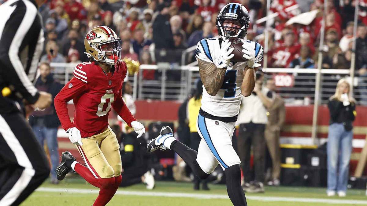 Carolina Panthers wide receiver Tetairoa McMillan (4) makes a touchdown catch against San Francisco 49ers cornerback Renardo Green (0) during the second half at Levi's Stadium.