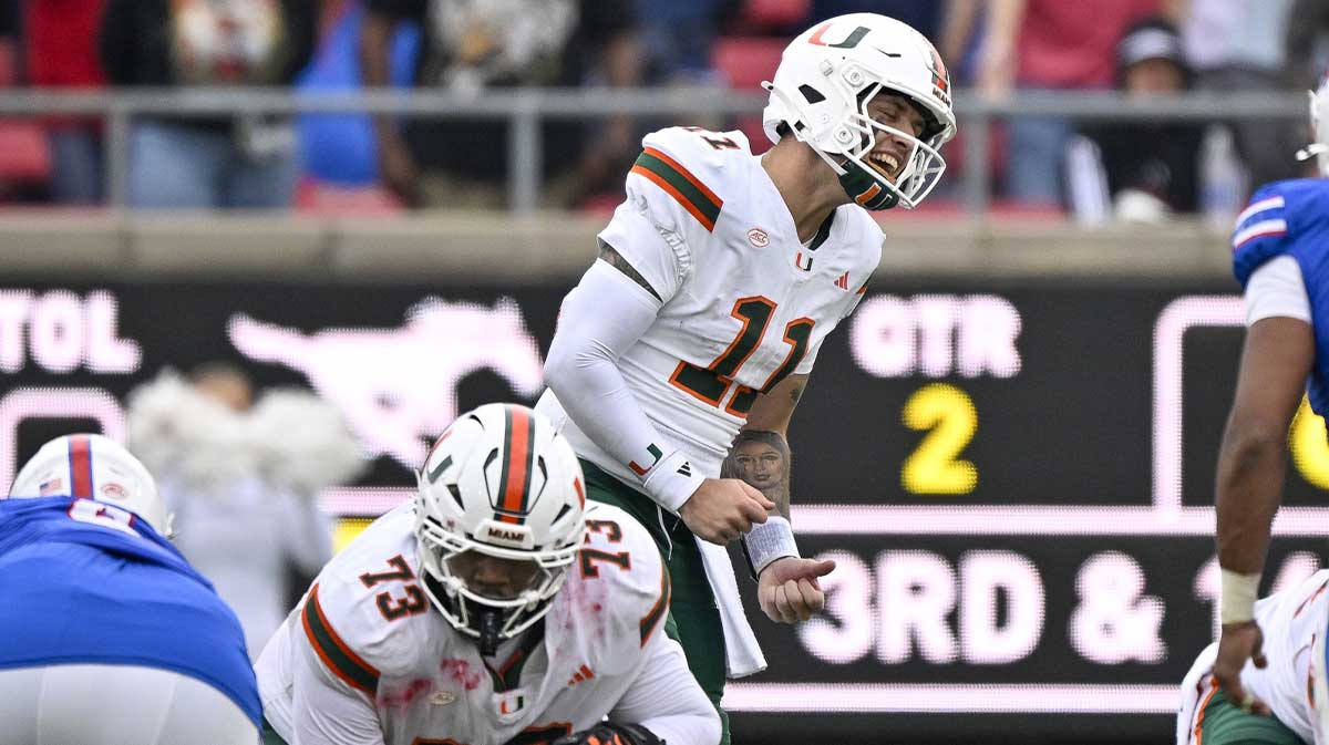 Miami Hurricanes quarterback Carson Beck (11) reacts to a false start penalty by the offense during the second quarter against the SMU Mustangs at Gerald J. Ford Stadium.