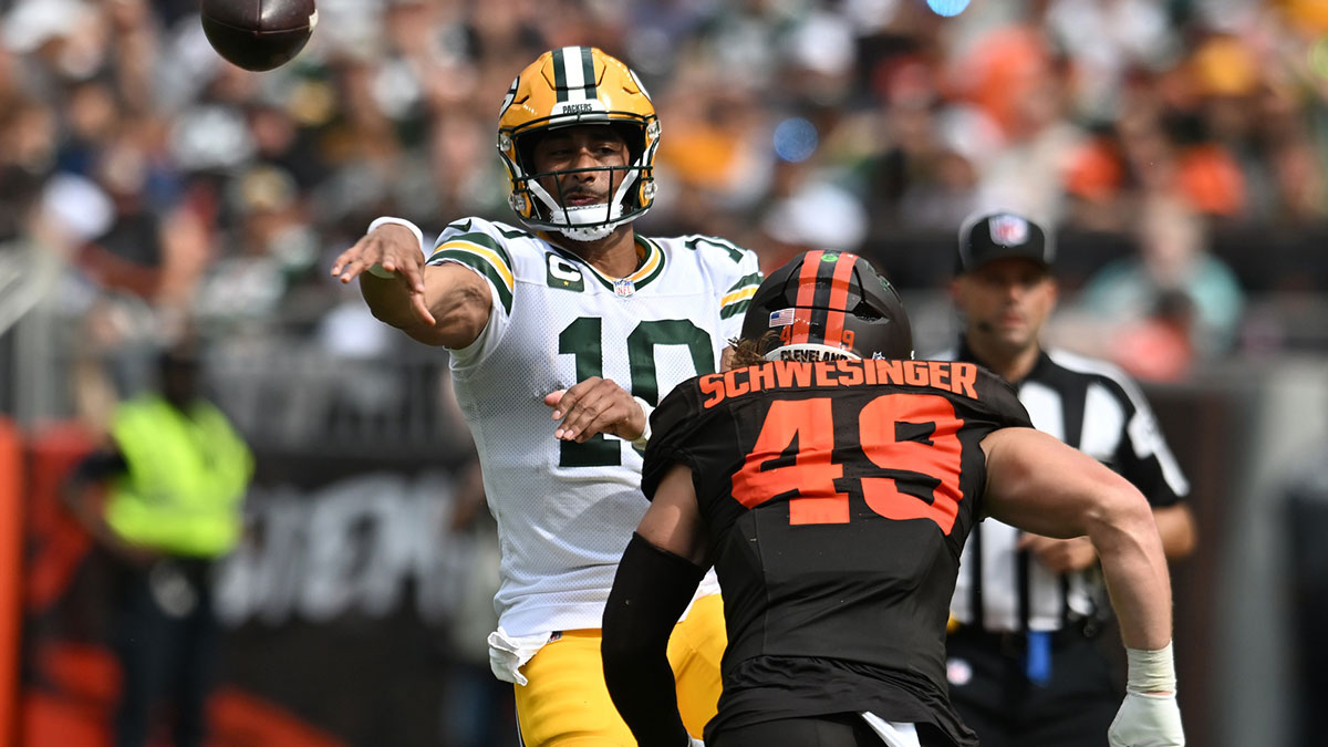 Green Bay Packers quarterback Jordan Love (10) throws a pass as Cleveland Browns linebacker Carson Schwesinger (49) rushes during the second half at Huntington Bank Field.