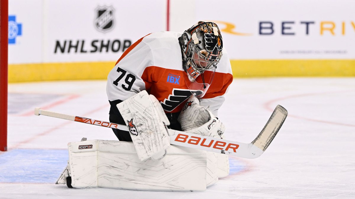 Philadelphia Flyers goalie Carter Hart (79) makes a save against the New Jersey Devils in the first period at Wells Fargo Center