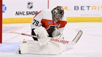 Philadelphia Flyers goalie Carter Hart (79) makes a save against the New Jersey Devils in the first period at Wells Fargo Center