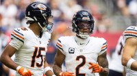Chicago Bears wide receiver DJ Moore (2) and Rome Odunze (15) against the Arizona Cardinals at State Farm Stadium.