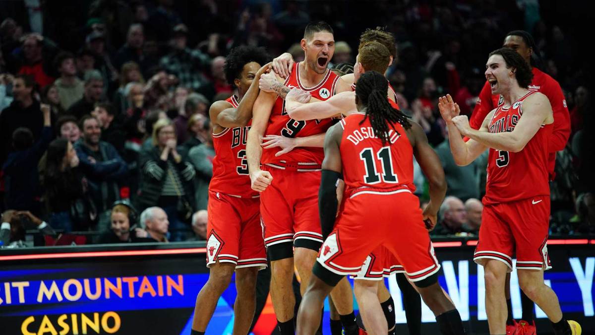 Nov 19, 2025; Portland, Oregon, USA; Chicago Bulls center Nikola Vucevic (9) celebrates with teammates after the game winning buzzer beater three point basket against the Portland Trail Blazers at Moda Center. Mandatory Credit: Soobum Im-Imagn Images