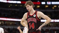 Nov 21, 2025; Chicago, Illinois, USA; Chicago Bulls forward Matas Buzelis (14) reacts during the second half at United Center. Mandatory Credit: Kamil Krzaczynski-Imagn Images