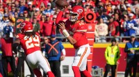 Kansas City Chiefs quarterback Patrick Mahomes (15) throws a pass against the Indianapolis Colts in the first quarter at GEHA Field at Arrowhead Stadium.