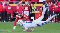 Kansas City Chiefs cornerback Jaylen Watson (35) breaks up a pass intended for Indianapolis Colts wide receiver Michael Pittman Jr. (11) in the second half at GEHA Field at Arrowhead Stadium.
