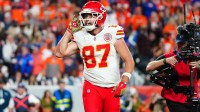 Kansas City Chiefs tight end Travis Kelce (87) reacts after his touchdown in the fourth quarter against the Denver Broncos at Empower Field at Mile High.
