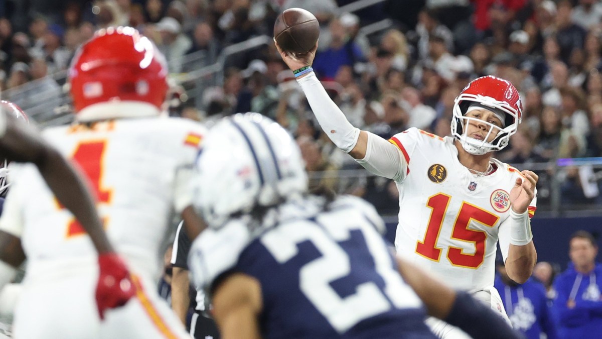 Kansas City Chiefs quarterback Patrick Mahomes (15) throws a pass against the Dallas Cowboys during the fourth quarter at AT&amp;T Stadium.