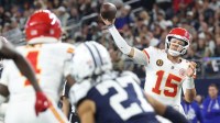 Kansas City Chiefs quarterback Patrick Mahomes (15) throws a pass against the Dallas Cowboys during the fourth quarter at AT&T Stadium.
