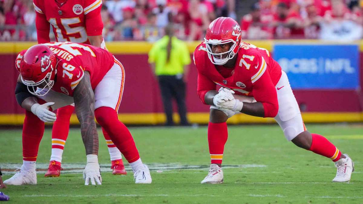 Kansas City Chiefs offensive tackle Kingsley Suamataia (76) and offensive tackle Josh Simmons (71) at the line of scrimmage against the Baltimore Ravens during the game at GEHA Field at Arrowhead Stadium.
