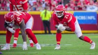 Kansas City Chiefs offensive tackle Kingsley Suamataia (76) and offensive tackle Josh Simmons (71) at the line of scrimmage against the Baltimore Ravens during the game at GEHA Field at Arrowhead Stadium.