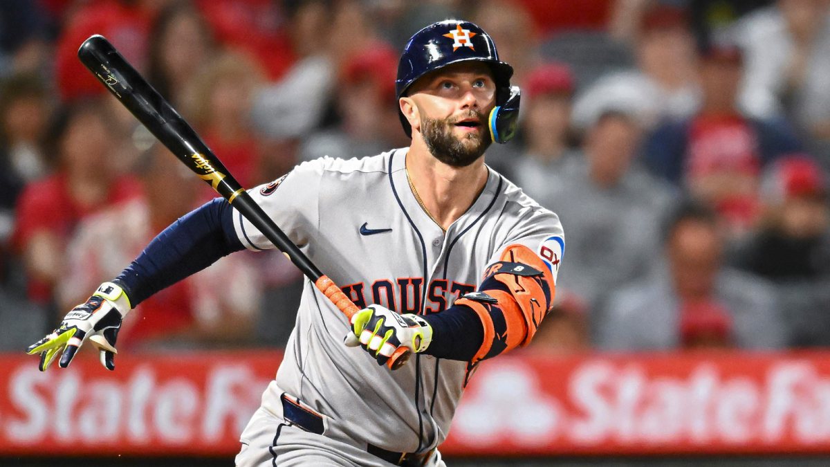 Houston Astros first baseman Christian Walker (8) forced out at first base against the Los Angeles Angels during the sixth inning at Angel Stadium