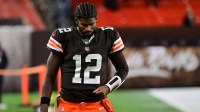 Cleveland Browns quarterback Shedeur Sanders (12) walks off the field following a game against the Baltimore Ravens at Huntington Bank Field.