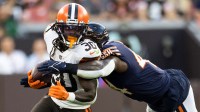 Cleveland Browns running back D'Ernest Johnson (30) is tackled by Chicago Bears linebacker Matt Adams (44) during the first quarter at FirstEnergy Stadium.
