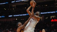 Cleveland Cavaliers center Jarrett Allen (31) shoots the ball against Atlanta Hawks forward Onyeka Okongwu (17) during the third quarter at State Farm Arena.