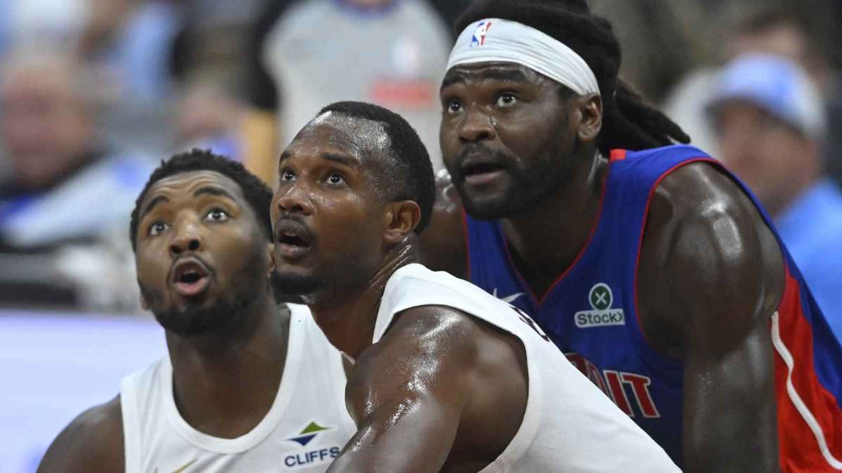 Cleveland Cavaliers guard Donovan Mitchell (45), center Evan Mobley (4) and Detroit Pistons forward Isaiah Stewart (28) look to rebound in the second quarter at Rocket Arena.