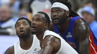 Cleveland Cavaliers guard Donovan Mitchell (45), center Evan Mobley (4) and Detroit Pistons forward Isaiah Stewart (28) look to rebound in the second quarter at Rocket Arena.
