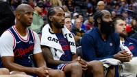 Los Angeles Clippers guard Chris Paul (3) and forward Kawhi Leonard (2) and guard James Harden (1) sit on the bench during the fourth quarter against the Sacramento Kings at Golden 1 Center.