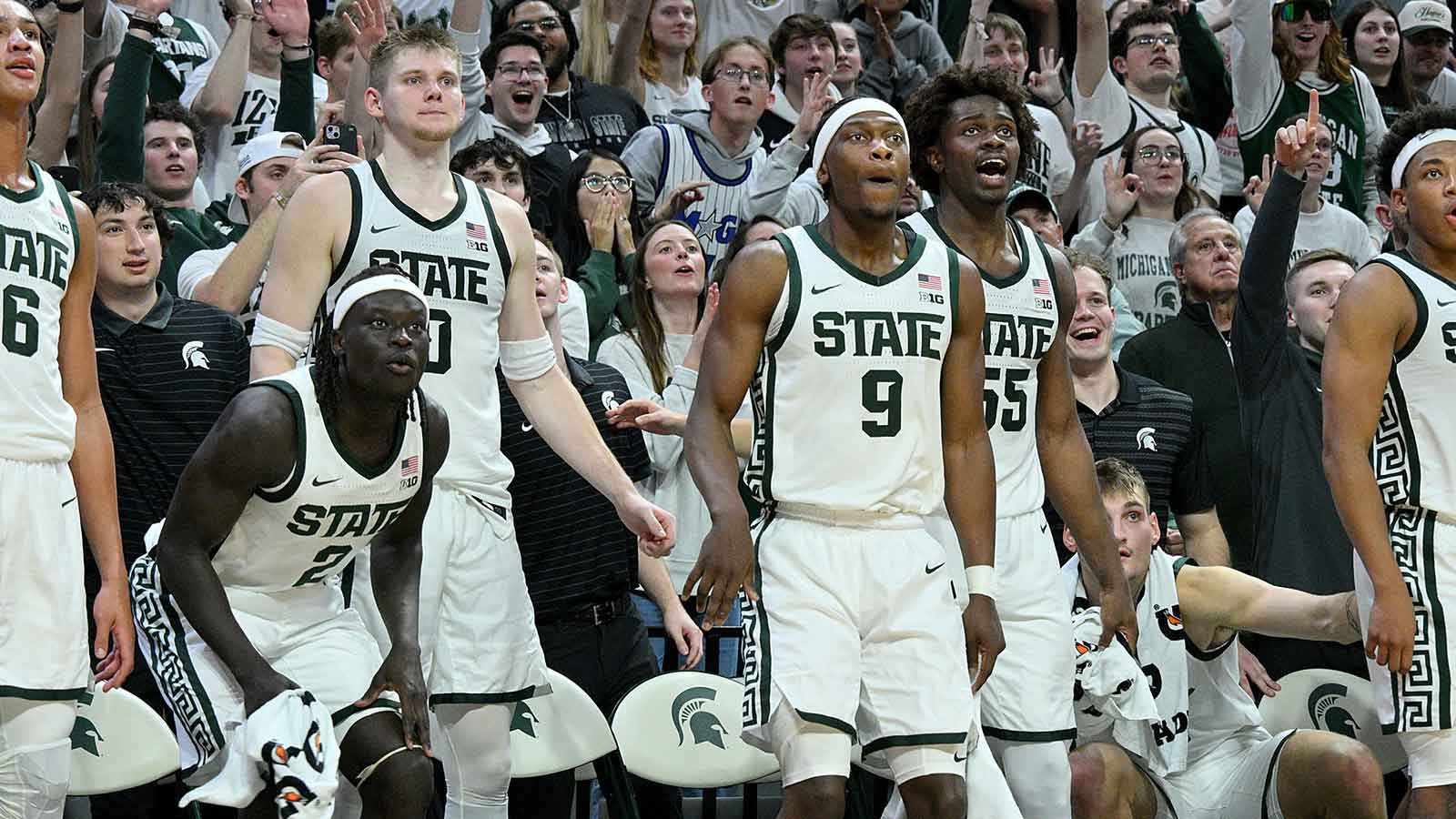 The Michigan State Spartan bench reacts against the Detroit Mercy Titans at the end of the game at Jack Breslin Student Events Center.