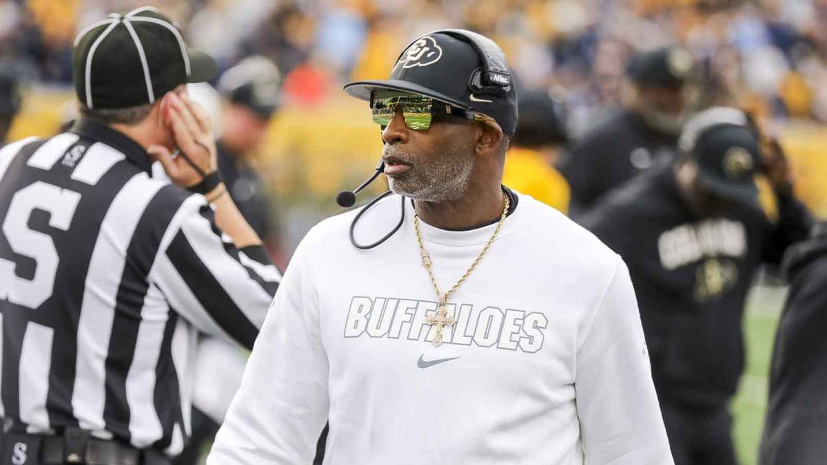 Colorado Buffaloes head coach Deion Sanders walks along the sidelines late in the fourth quarter against the West Virginia Mountaineers at Milan Puskar Stadium.