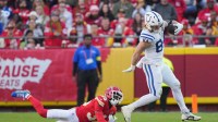 Indianapolis Colts tight end Tyler Warren (84) runs against Kansas City Chiefs cornerback Jaylen Watson (35) in the second half at GEHA Field at Arrowhead Stadium.