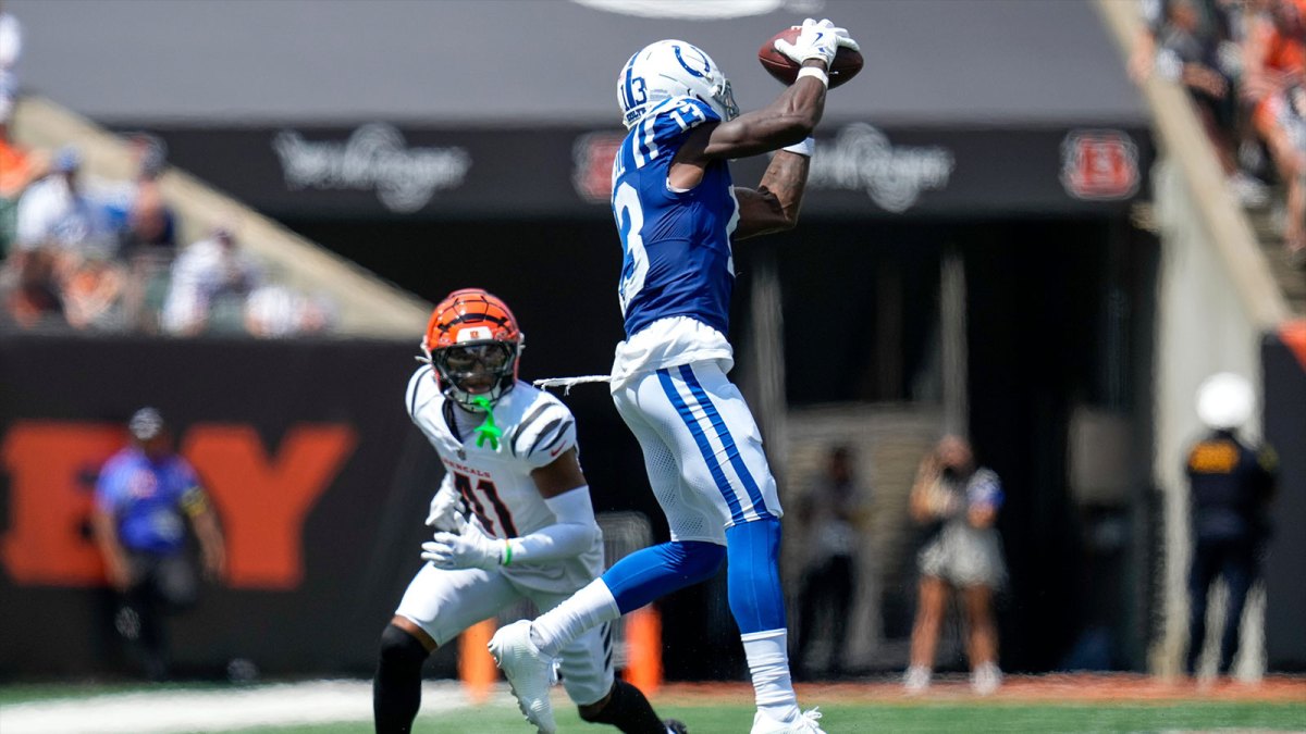 Indianapolis Colts wide receiver Laquon Treadwell (13) catches a pass ahead of Cincinnati Bengals cornerback Nate Brooks (41) in the second quarter of the NFL Preseason Week 3 game between the Cincinnati Bengals and the Indianapolis Colts at Paycor Stadium in Cincinnati on Saturday, Aug. 23, 2025. The Colts led 24-7 at halftime.