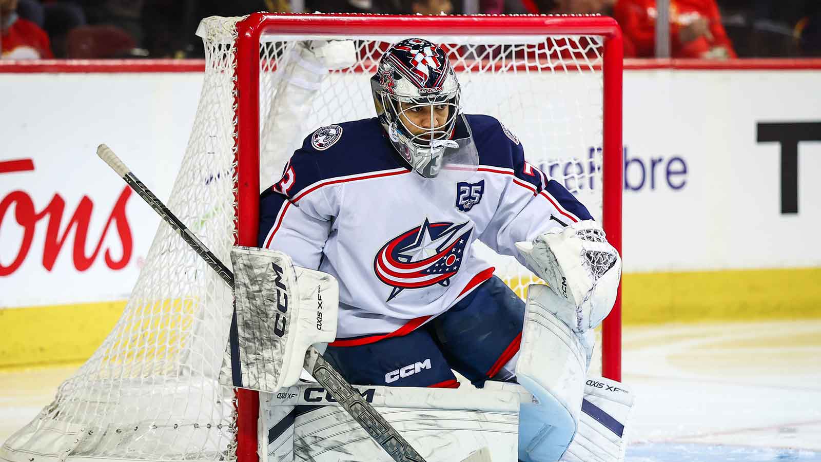 Columbus Blue Jackets goaltender Jet Greaves (73) guards his net against the Calgary Flames during the second period at Scotiabank Saddledome. 