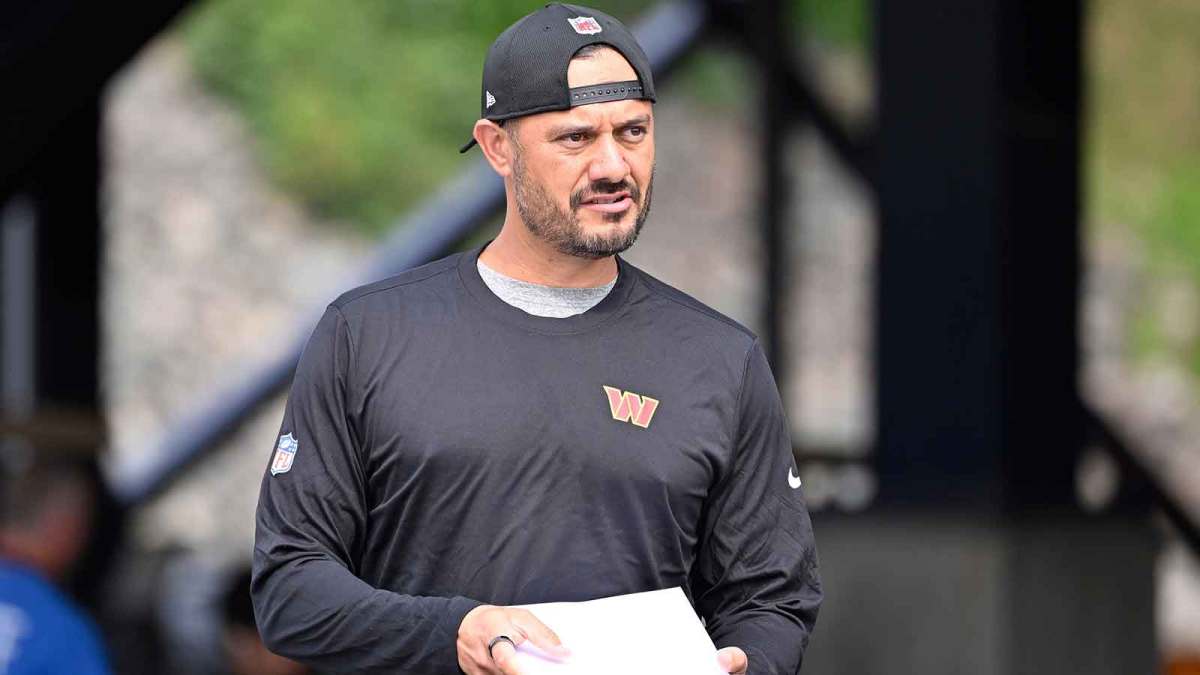 Washington Commanders quarterbacks coach Tavita Pritchard arrives at training camp at Gillette Stadium.