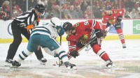 San Jose Sharks center Mikael Granlund (64) and Chicago Blackhawks center Connor Bedard (98) face off during the first period at United Center.