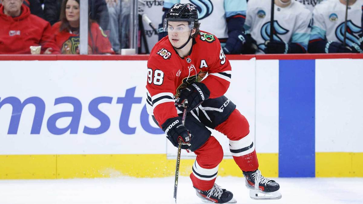 Chicago Blackhawks center Connor Bedard (98) looks to pass the puck against the Seattle Kraken during the first period at United Center.