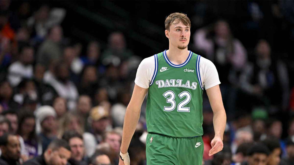 Dallas Mavericks forward Cooper Flagg (32) walks back up the court during the second half against the Phoenix Suns at the American Airlines Center.