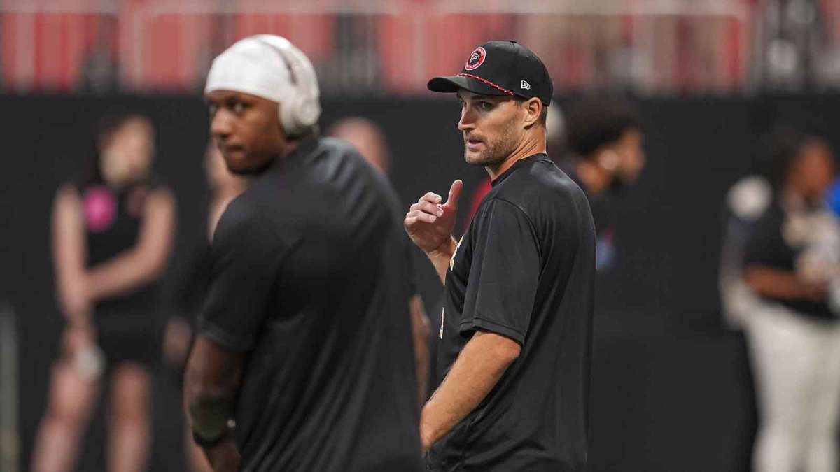 Atlanta Falcons quarterbacks Michael Penix Jr. (9) and Kirk Cousins (18) on the field prior to the game against the Pittsburgh Steelers at Mercedes-Benz Stadium.