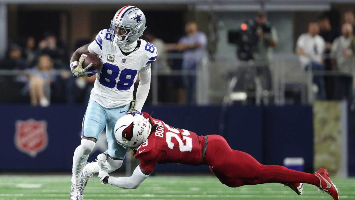 Dallas Cowboys wide receiver CeeDee Lamb (88) runs against Arizona Cardinals cornerback Denzel Burke (29) in the second half at AT&T Stadium.