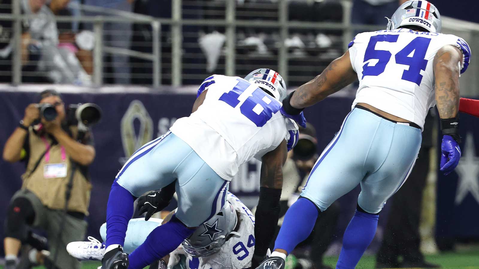 Dallas Cowboys defensive end Marshawn Kneeland (94) recovers a blocked punt for a touchdown against the Arizona Cardinals in the first half at AT&T Stadium. 