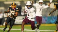 Texas A&M Aggies wide receiver Mario Craver (1) runs with the ball during the first half against the Missouri Tigers at Faurot Field at Memorial Stadium
