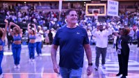 Dallas Mavericks minority owner Mark Cuban walks off the court after the game against the Toronto Raptors at the American Airlines Center.