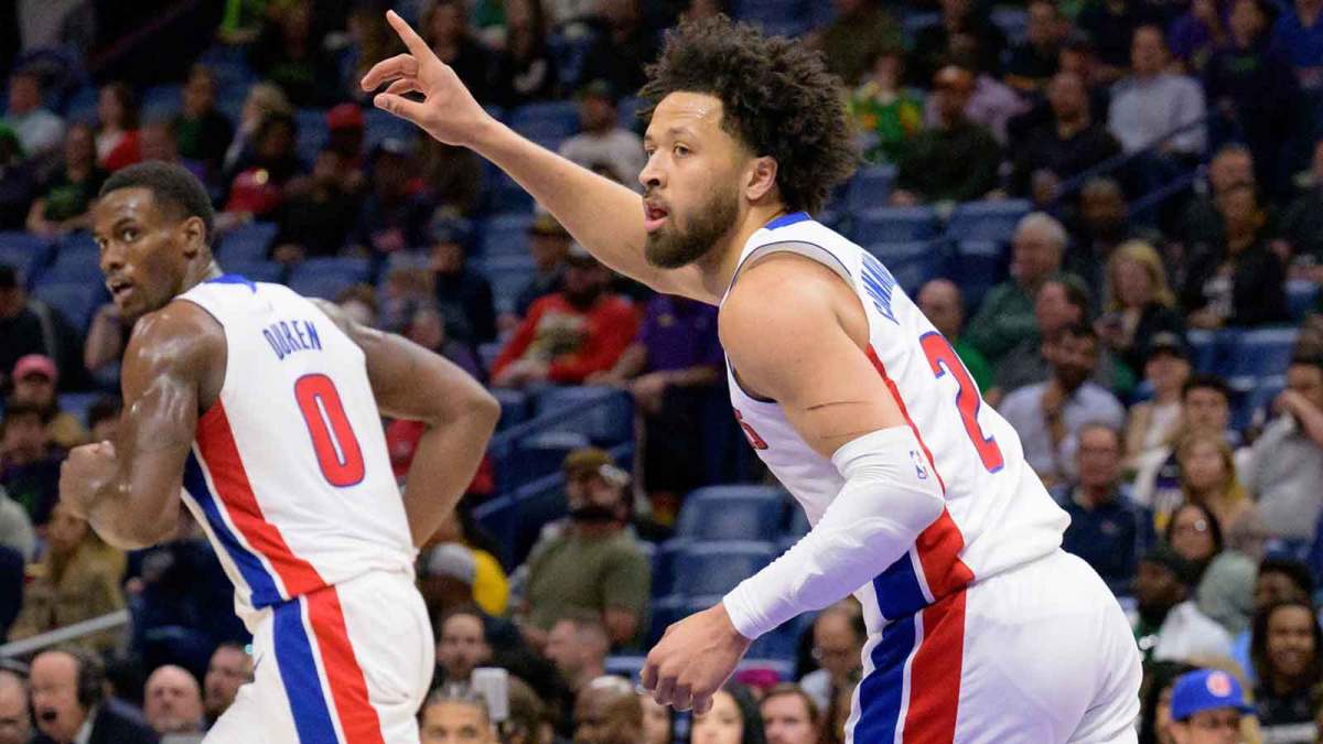 Detroit Pistons guard Cade Cunningham (2) reacts after a score next to center Jalen Duren (0) during the first half against the New Orleans Pelicans at Smoothie King Center.