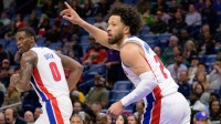 Detroit Pistons guard Cade Cunningham (2) reacts after a score next to center Jalen Duren (0) during the first half against the New Orleans Pelicans at Smoothie King Center.