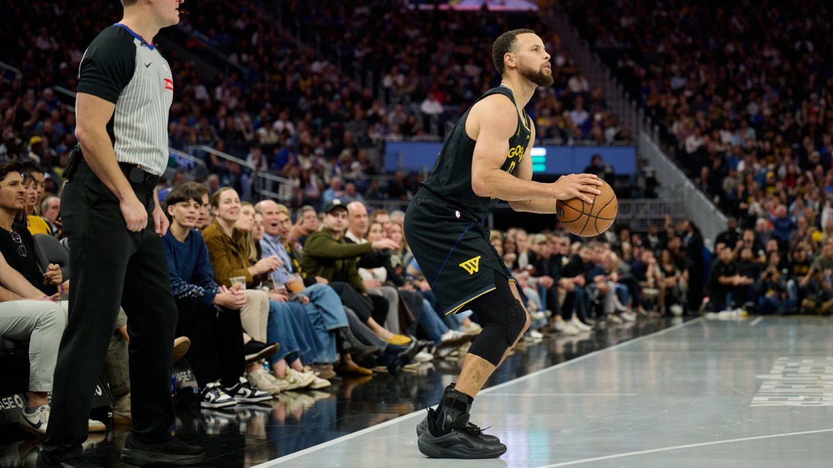 Golden State Warriors guard Stephen Curry (30) looks to shoot a three-point shot wearing Li Ning Jimmy Butler 4 (JB4) Black Knight shoes against the Portland Trail Blazers during the fourth quarter at Chase Center.