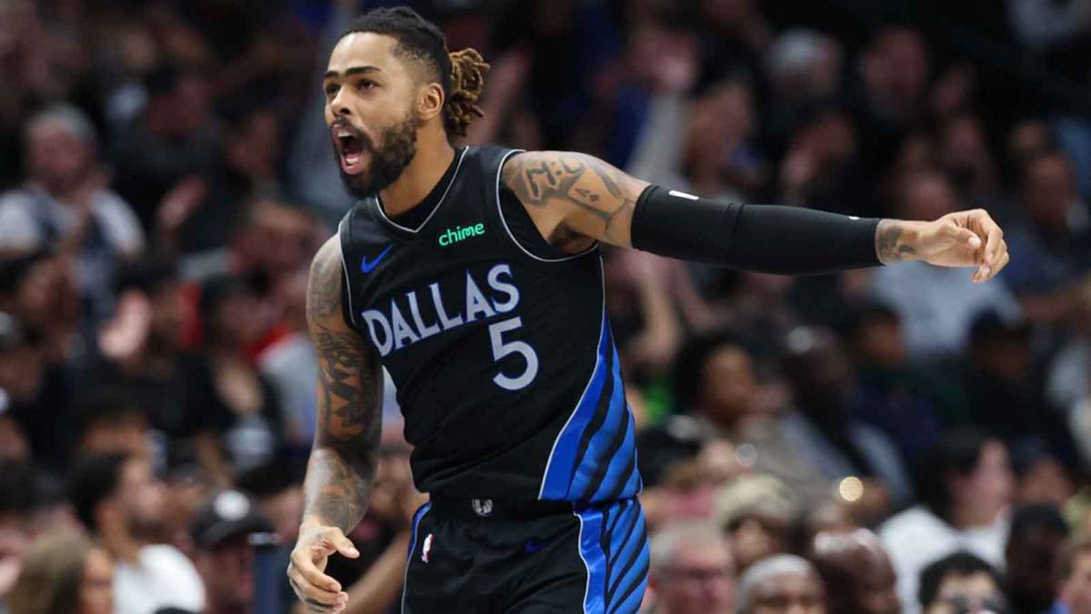 Dallas Mavericks guard D'Angelo Russell (5) reacts after scoring during the second half against the Portland Trail Blazers at American Airlines Center.