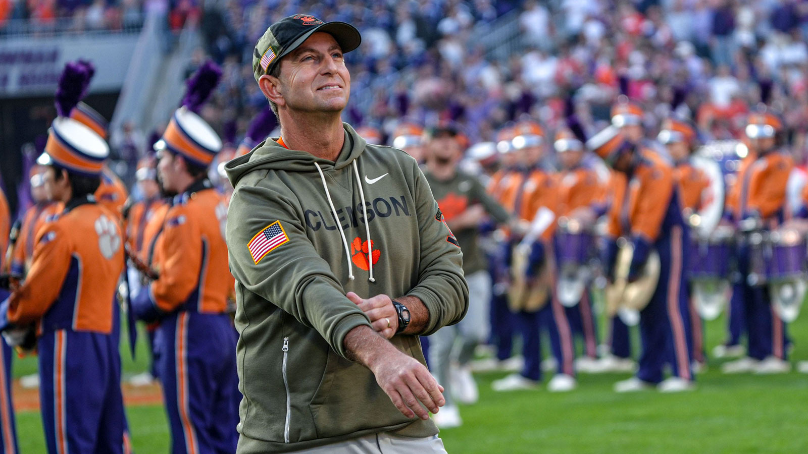 Clemson head coach Dabo Swinney watches as seniors walk down the hill before kickoff with Furman University at Memorial Stadium in Clemson, SC, Saturday, November 22, 2025.