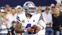 Dallas Cowboys quarterback Dak Prescott (4) warms up before the game against the Arizona Cardinals at AT&T Stadium.