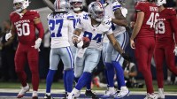 Dallas Cowboys defensive end Marshawn Kneeland (94) celebrates after recovering a blocked punt for a touchdown against the Arizona Cardinals in the first half at AT&T Stadium.