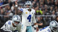 Dallas Cowboys quarterback Dak Prescott (4) gestures at the line of scrimmage against the Las Vegas Raiders during the second half at Allegiant Stadium.