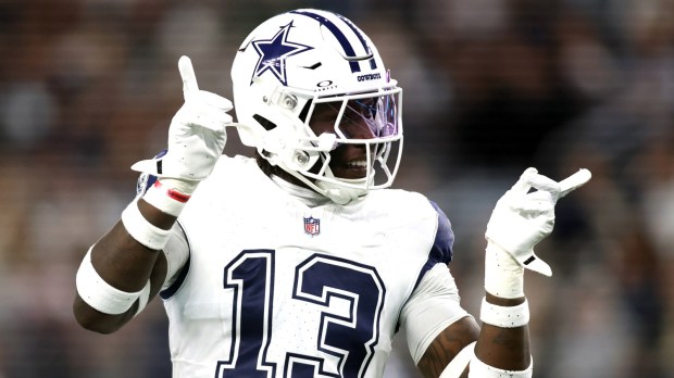Dallas Cowboys linebacker DeMarvion Overshown (13) reacts after making a tackle against the Cincinnati Bengals in the first quarter at AT&T Stadium.