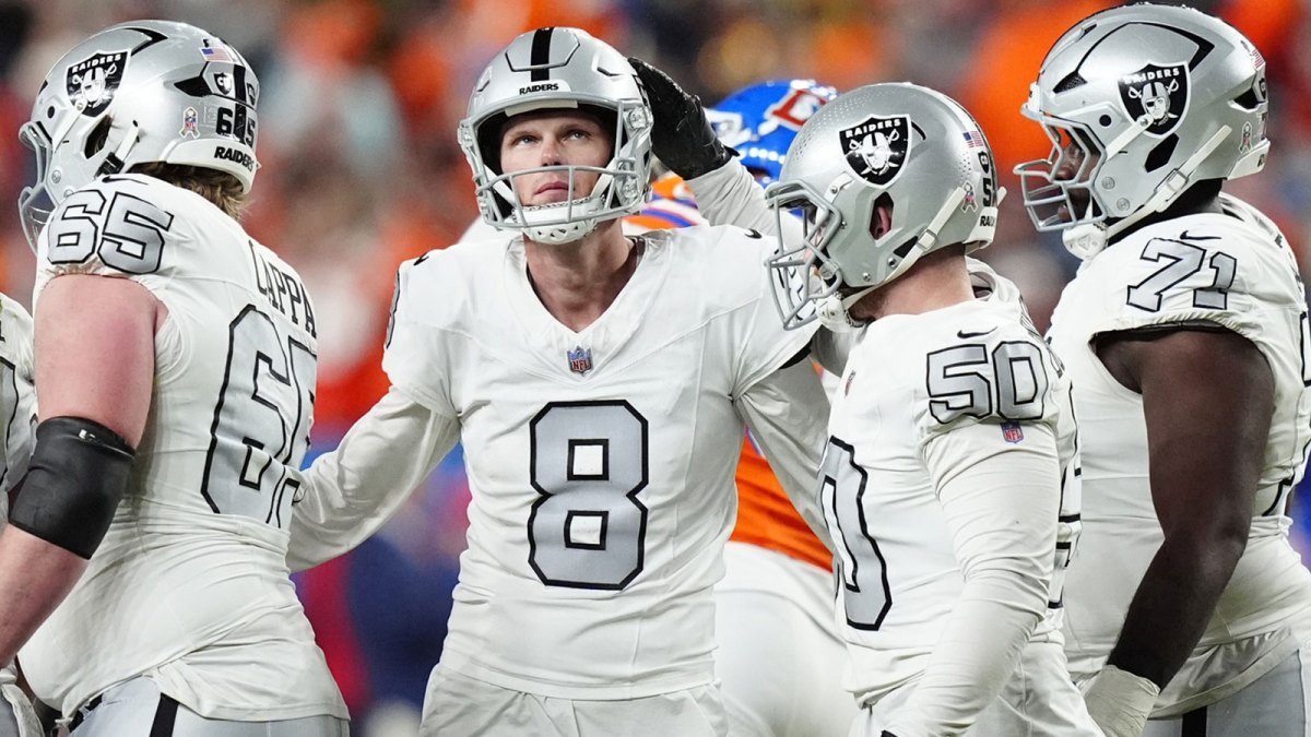 Las Vegas Raiders kicker Daniel Carlson (8) reacts after missing a field goal against the Denver Broncos during the second half at Empower Field at Mile High.